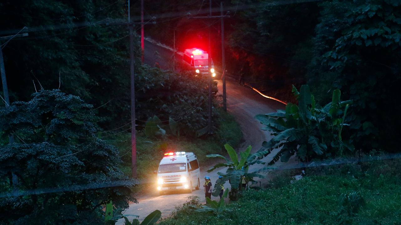 4 players, coach remain trapped in Thailand cave