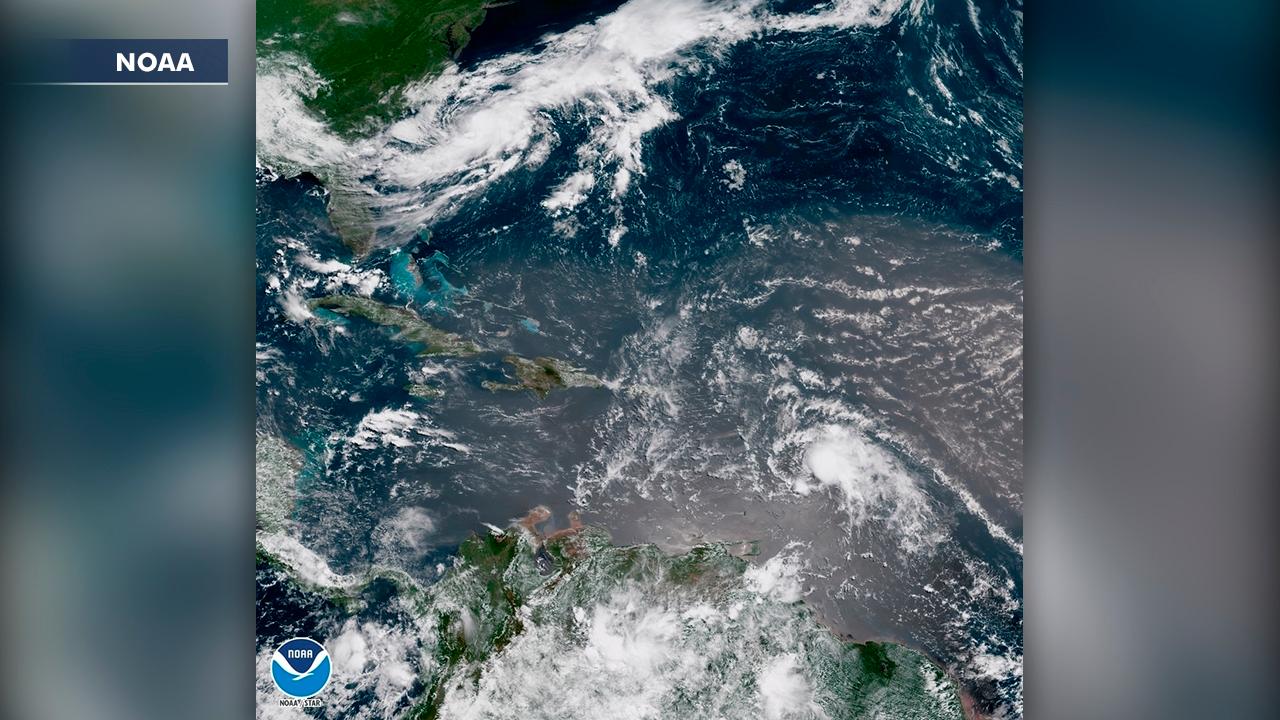 Beryl downgraded as Tropical Storm Chris gains strength