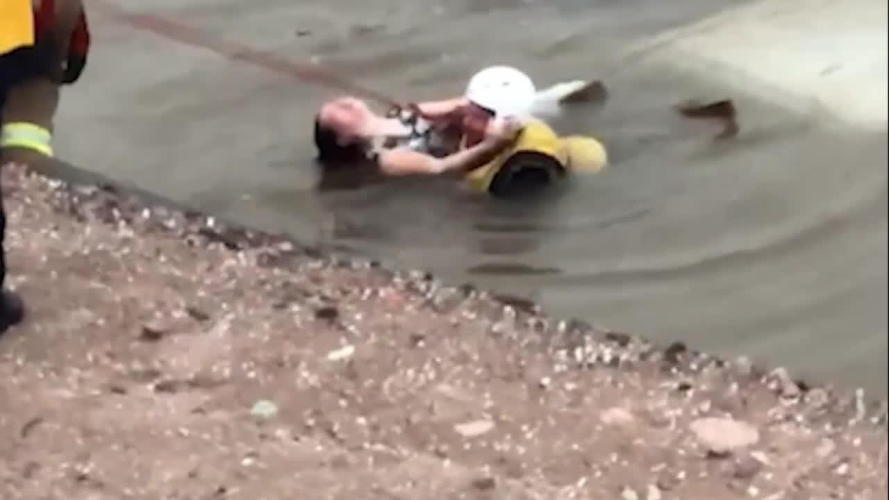 Arizona woman rescued from submerged car in canal