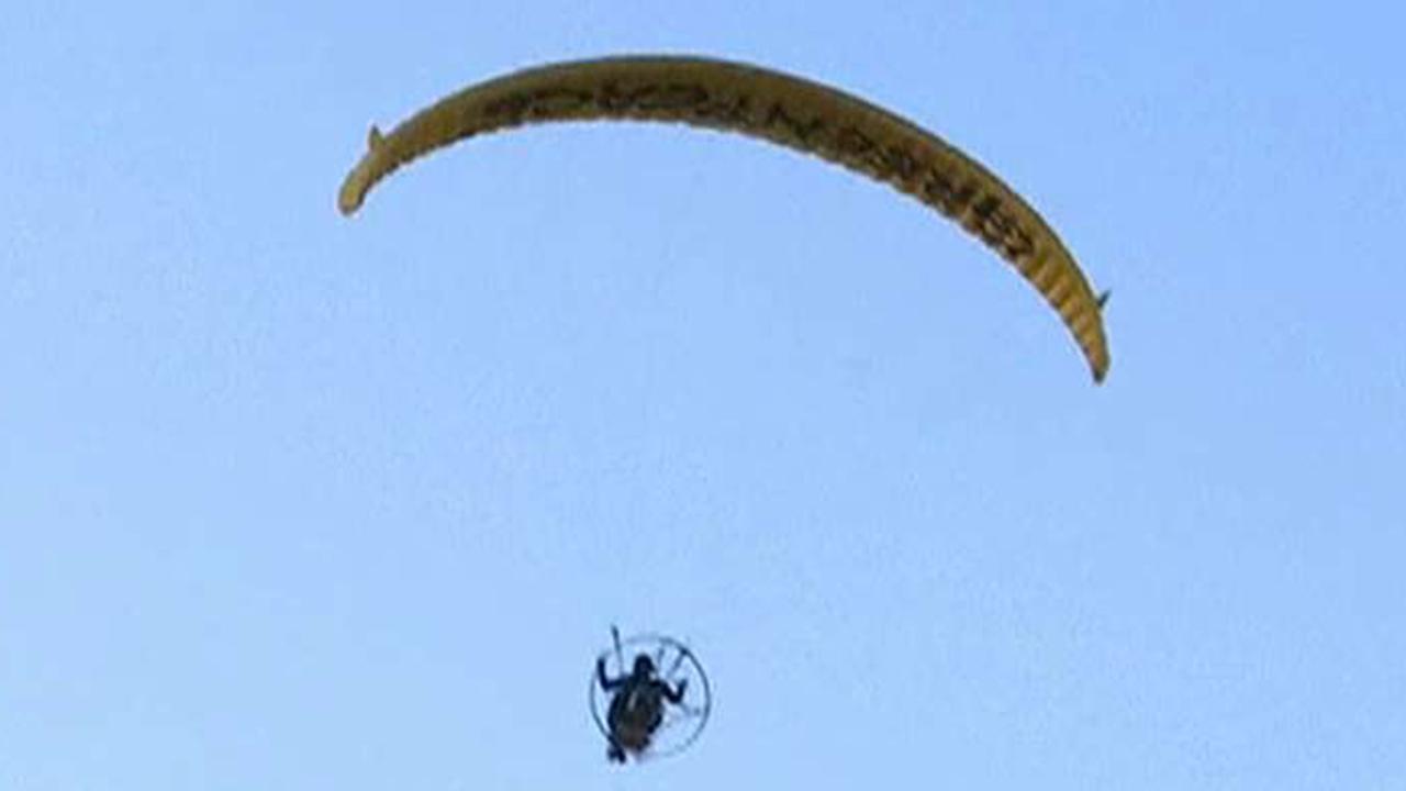 Anti-Trump paraglider arrested by Scottish police