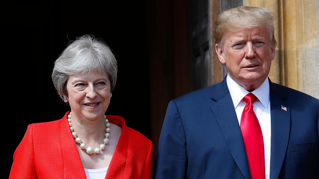 Theresa May says Trump advised her to sue the EU