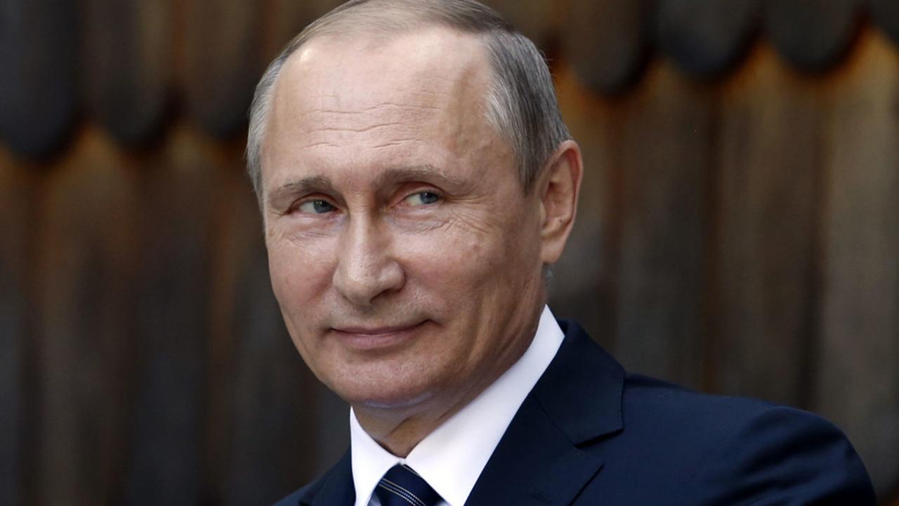Should Trump be cautious of former KGB Putin?