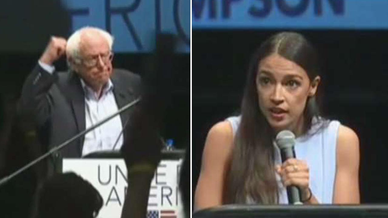 Ocasio-Cortez and Bernie Sanders campaign in Kansas