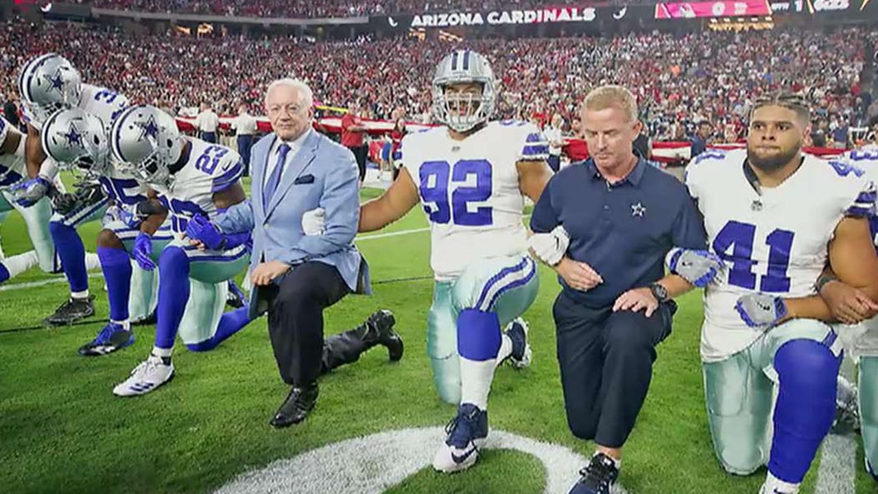Cowboys required to stand during anthem