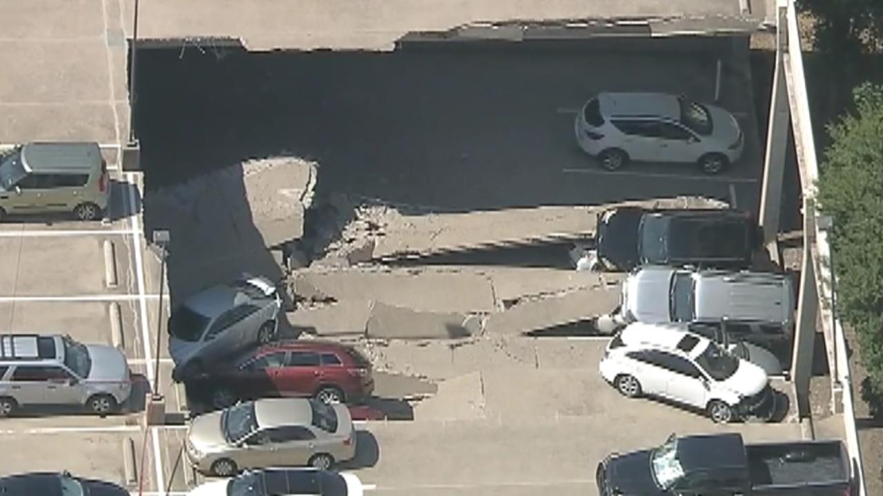Raw video: Two-story parking garage collapses in Texas