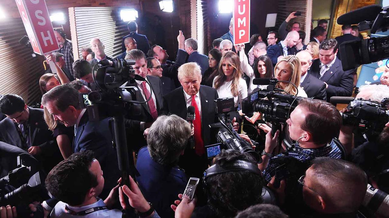 Tense relationship between Trump and media sparks debate