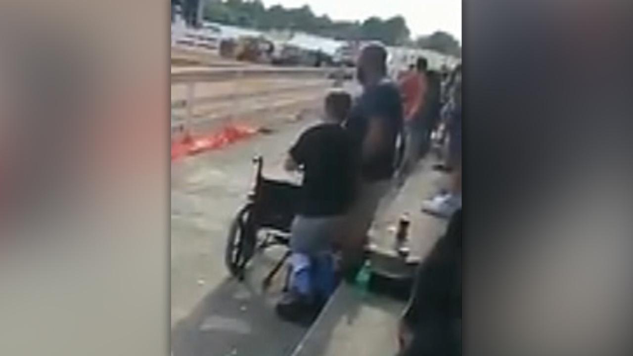 Boy in wheelchair stands for national anthem at Tenn. fair