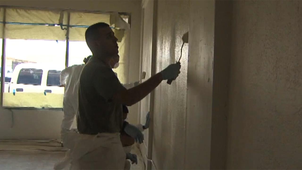 Army National Guard members clean home for homeless vets