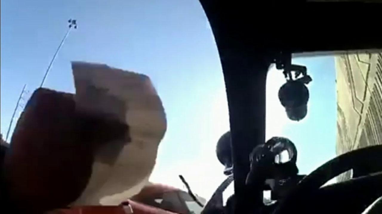 Raw video: Driver slams into Nevada trooper's car door