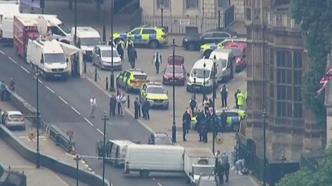 Car crashes into barrier outside UK Parliament