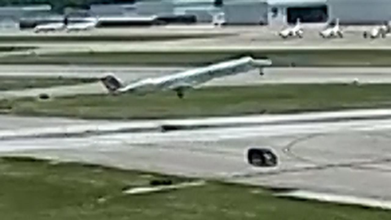 Plane narrowly misses van crossing runway