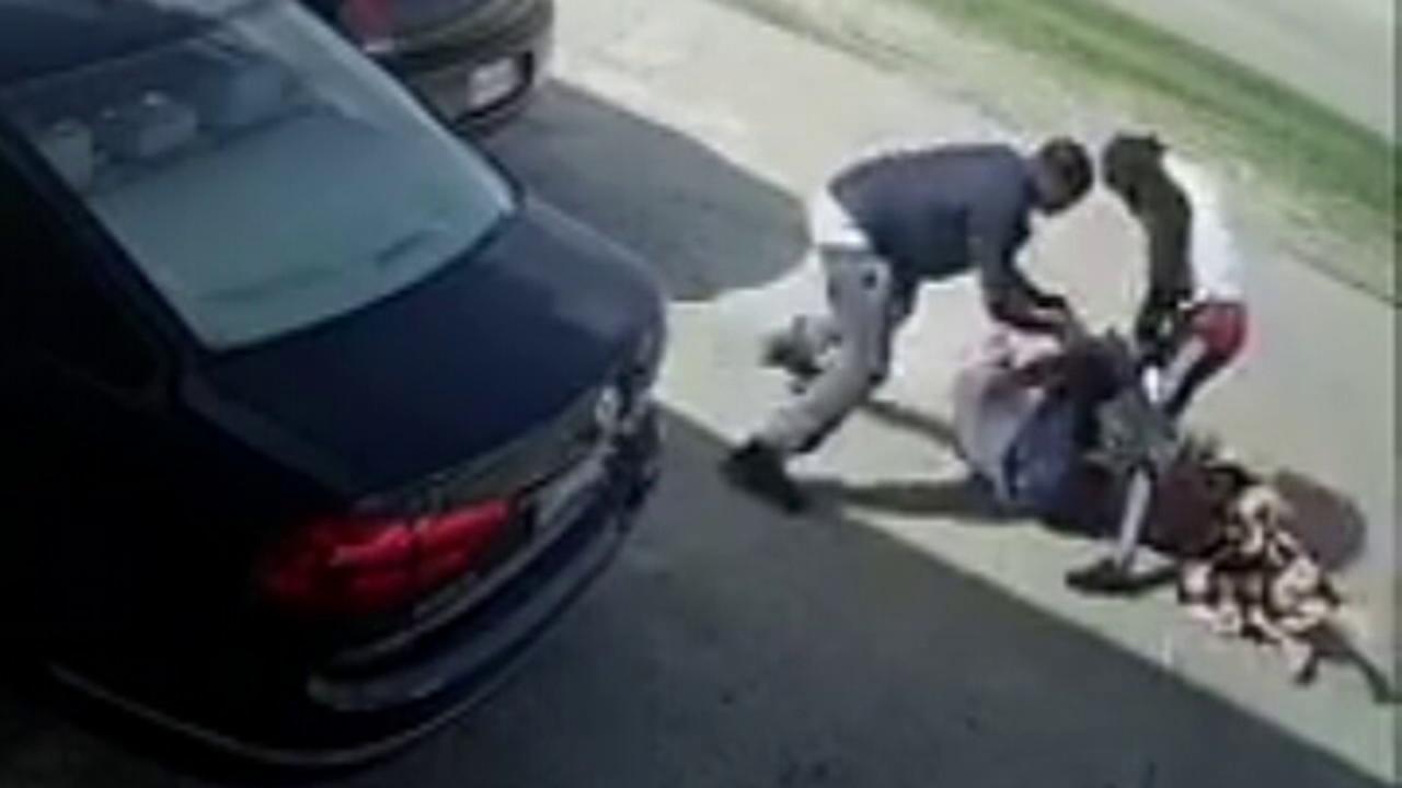 Warning, graphic video: Robbery suspect runs over victim