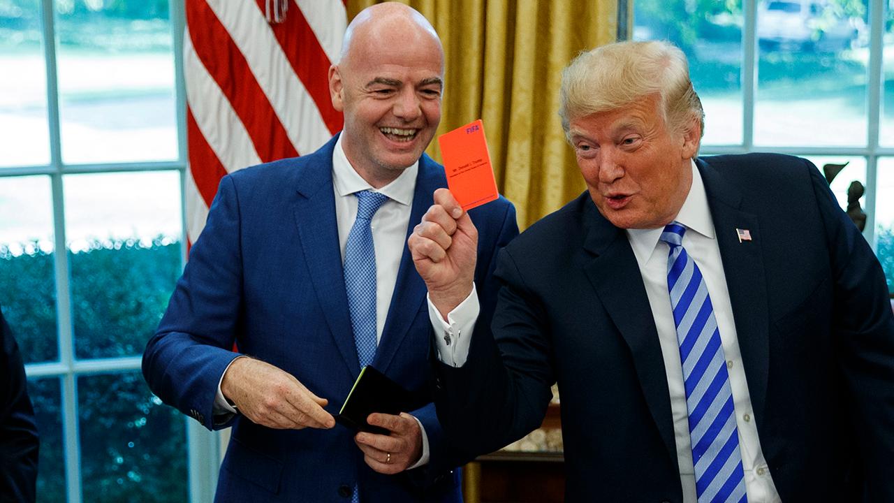 Trump gives media 'red card' at white house FIFA event