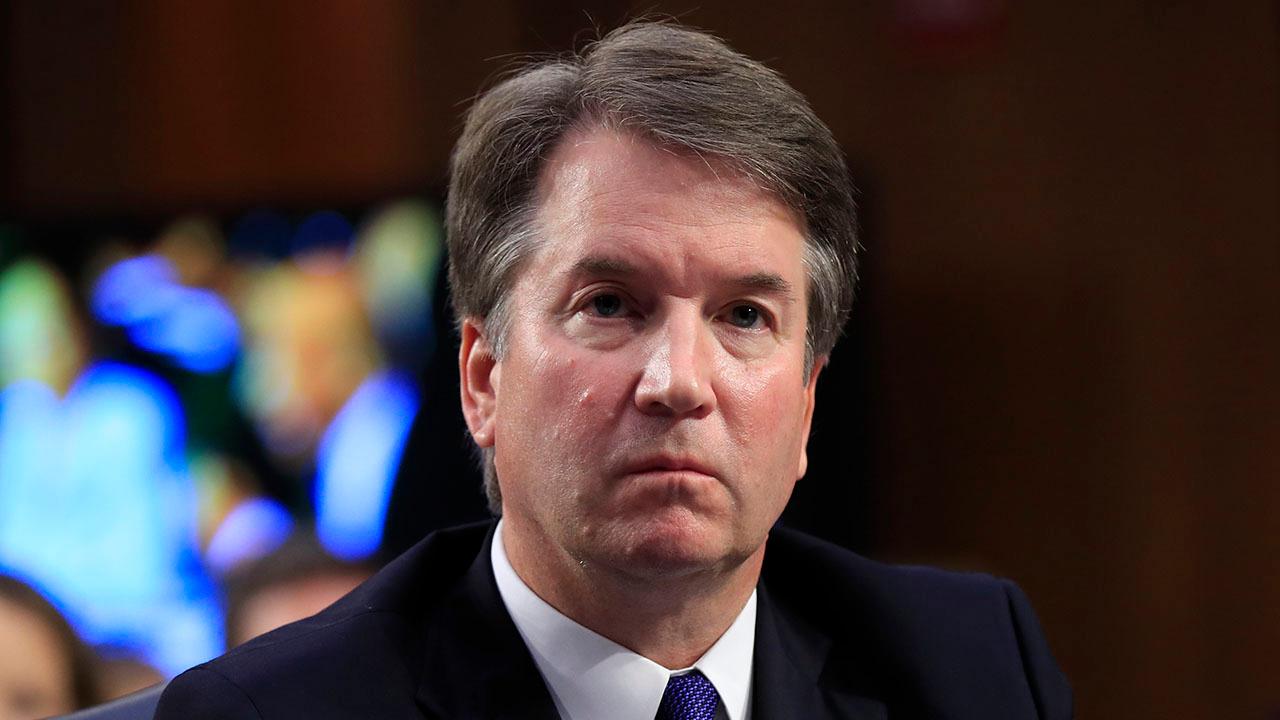 Kavanaugh quizzed over abortion, gun rights, executive power