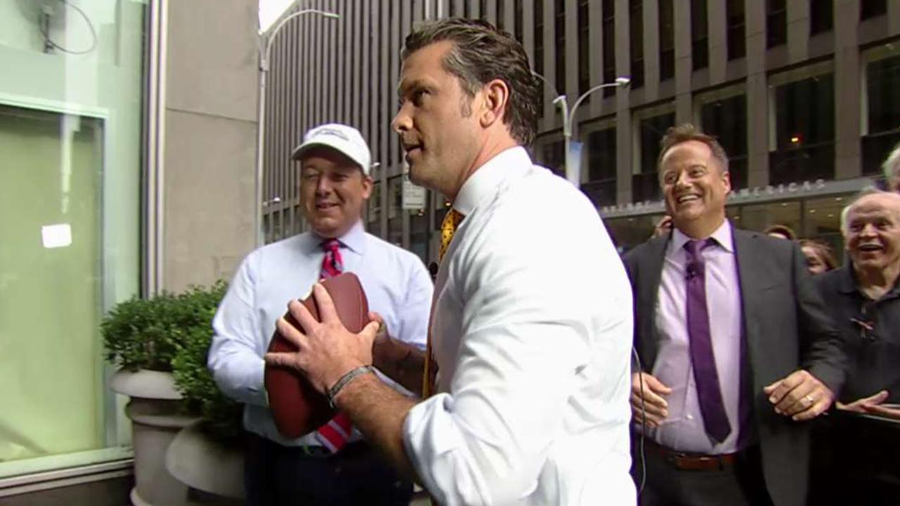 'Fox & Friends' co-hosts faceoff in a football competition