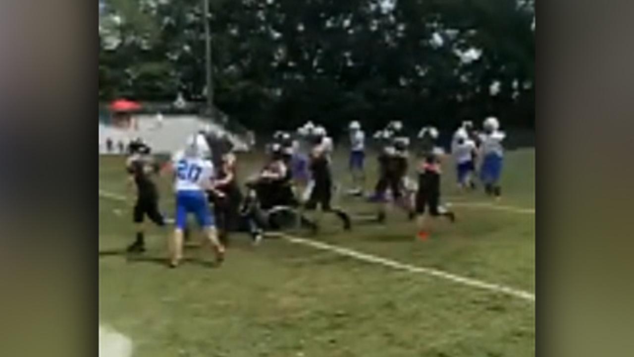 10-year-old with cerebral palsy scores touchdown