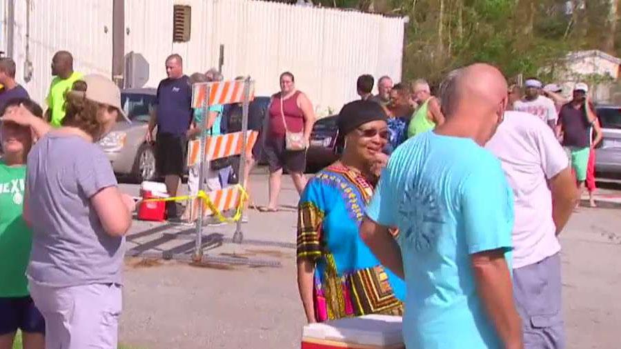 Florence victims line up for ice in Wilmington, NC