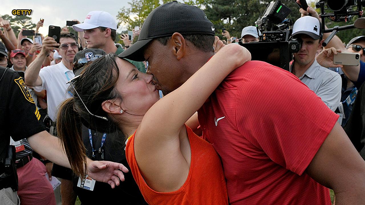 Tiger Woods embraces girlfriend Erica Herman after golf greats first tour victory since 2013 Fox News pic