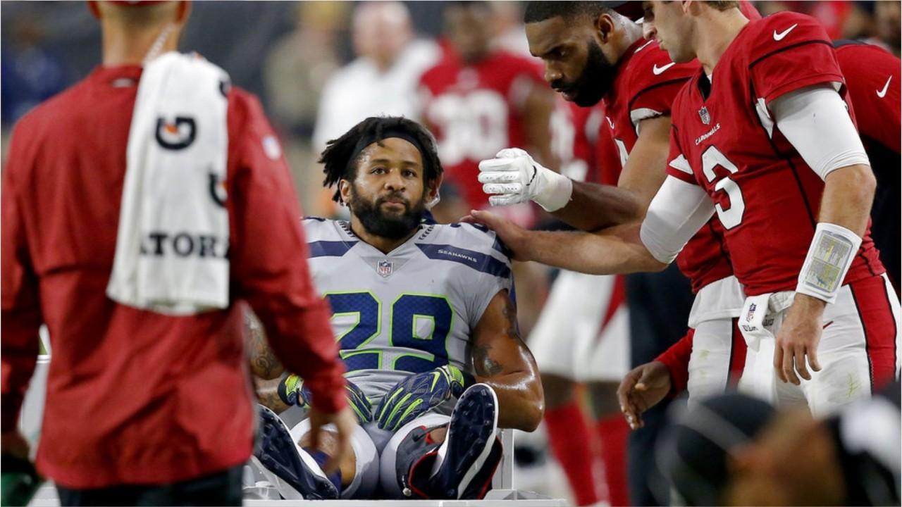 Seattle Seahawks safety Earl Thomas suffered a severe injury Sunday, and as he was leaving the field and gave his team the 'finger,' allegedly after he wasn't granted an extension.