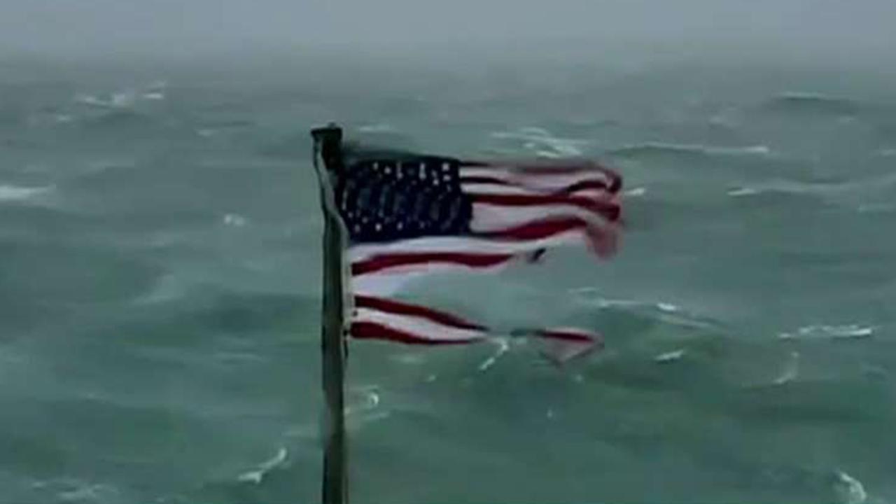 Tattered Hurricane Florence flag gets new owner
