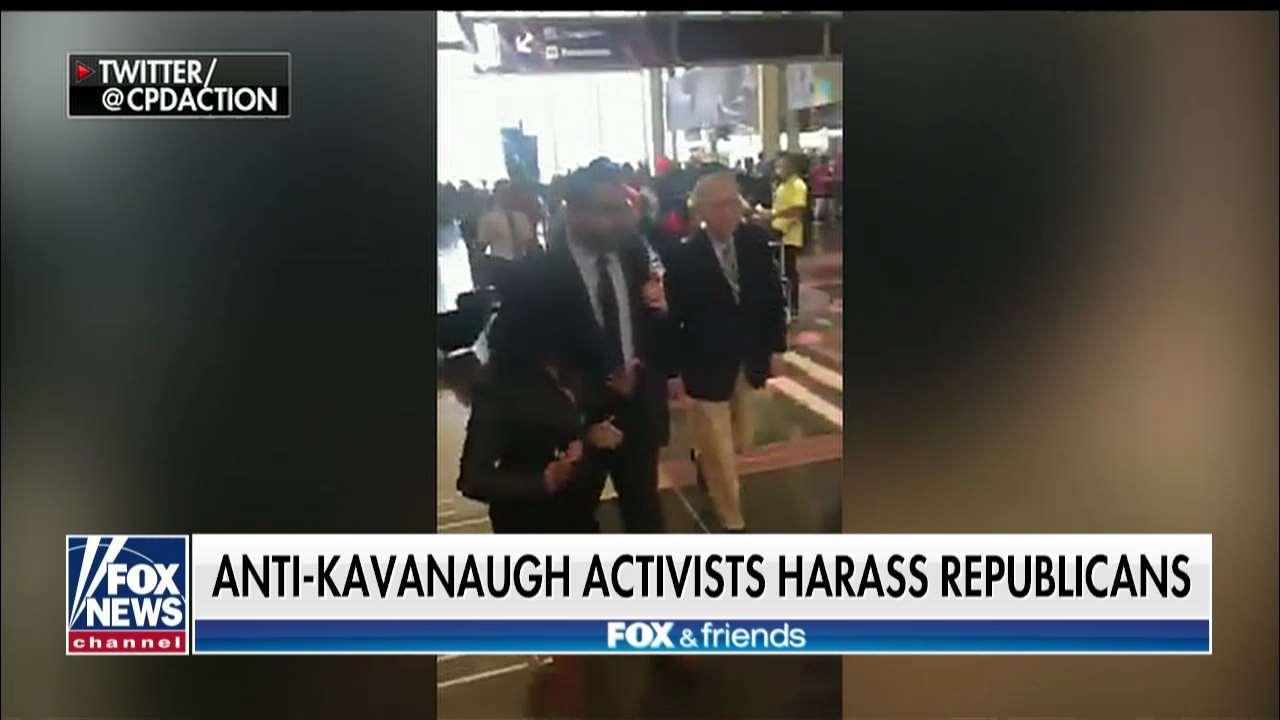 Anti-Kavanaugh Protesters Harass Mitch McConnell at Reagan National Airport