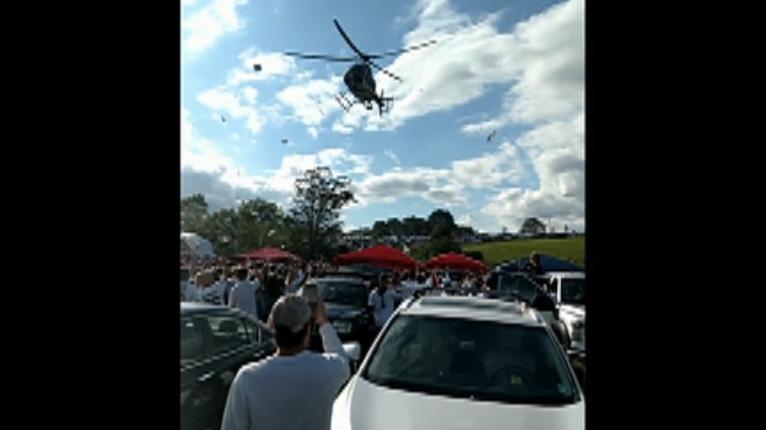 Police helicopter sends Penn State tailgate party flying