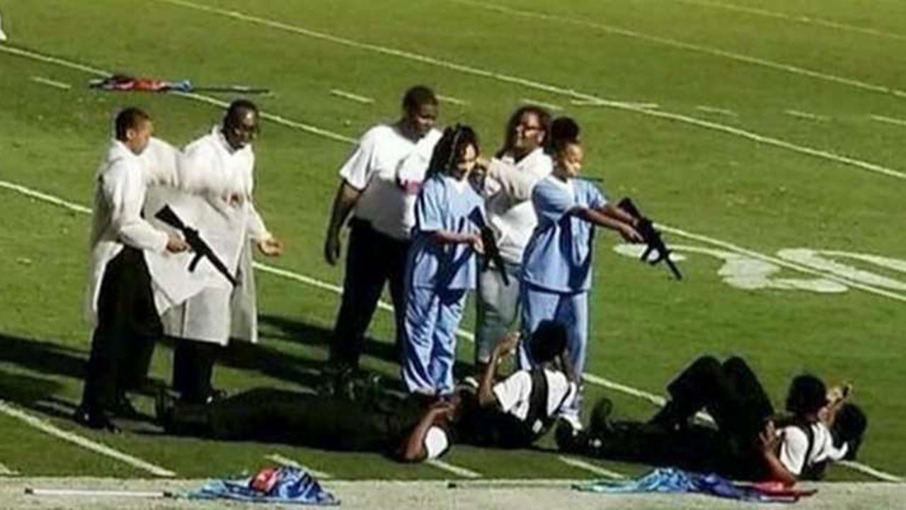Marching band depicts murder of police officers at gunpoint