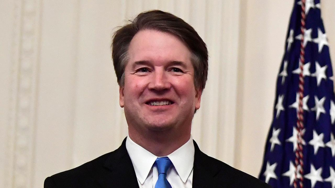 Justice Kavanaugh takes seat on Supreme Court for first time
