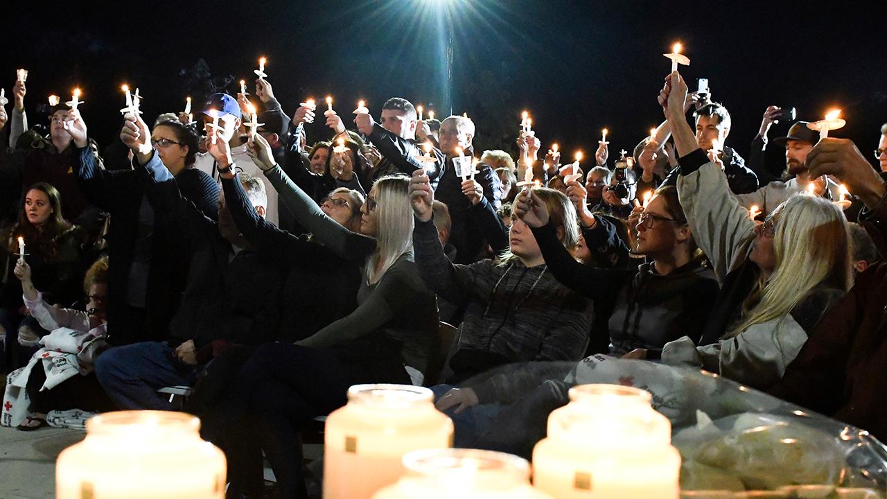 Community mourns limo victims as investigators probe cause