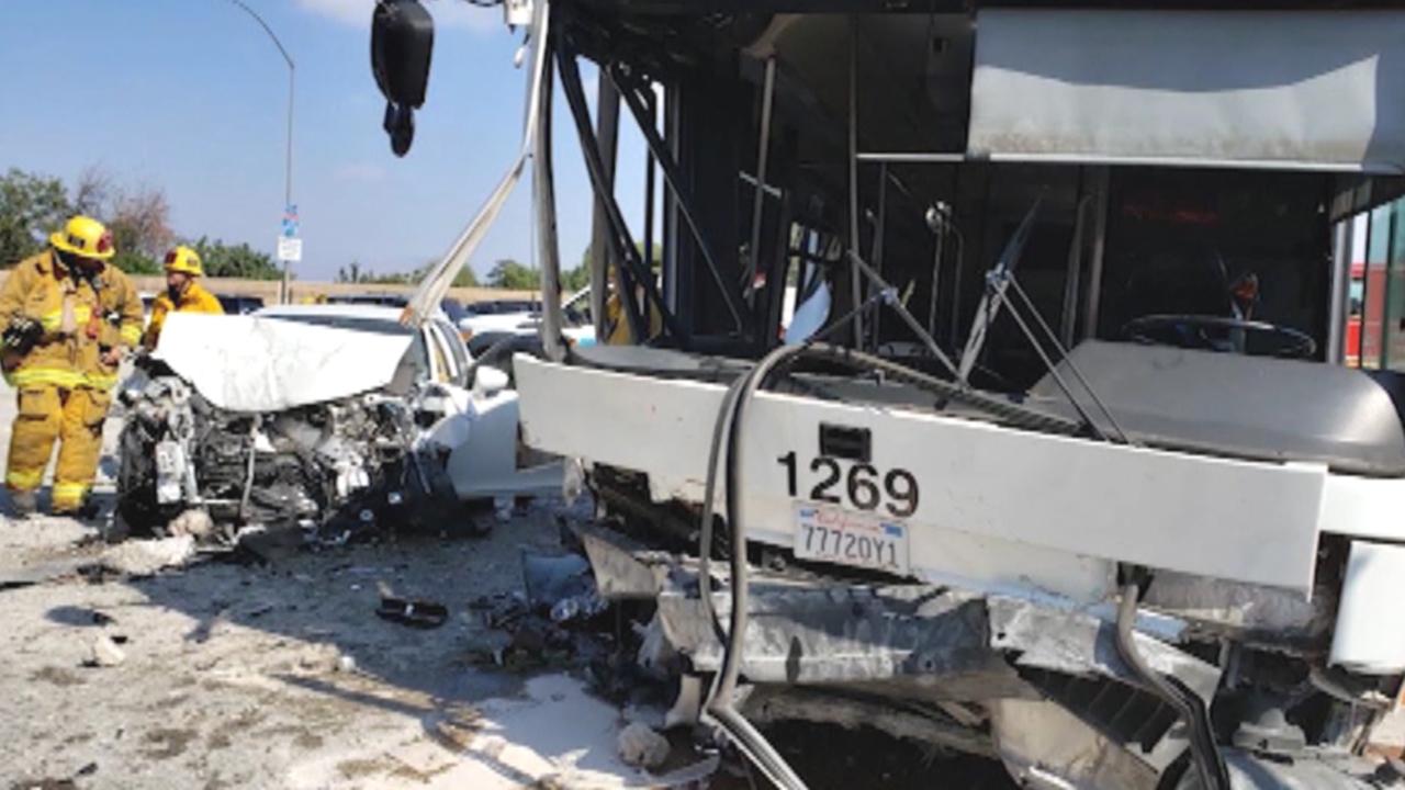 Bus crashes into concrete divider on California freeway