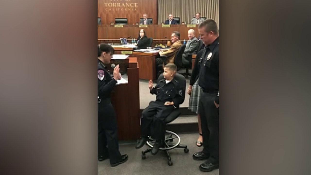 7-year-old sworn in as an Honorary Police Officer
