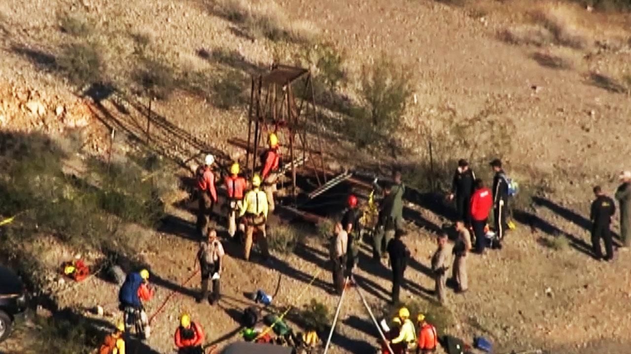 Arizona rescuers try save man stuck in 100-foot-deep mine