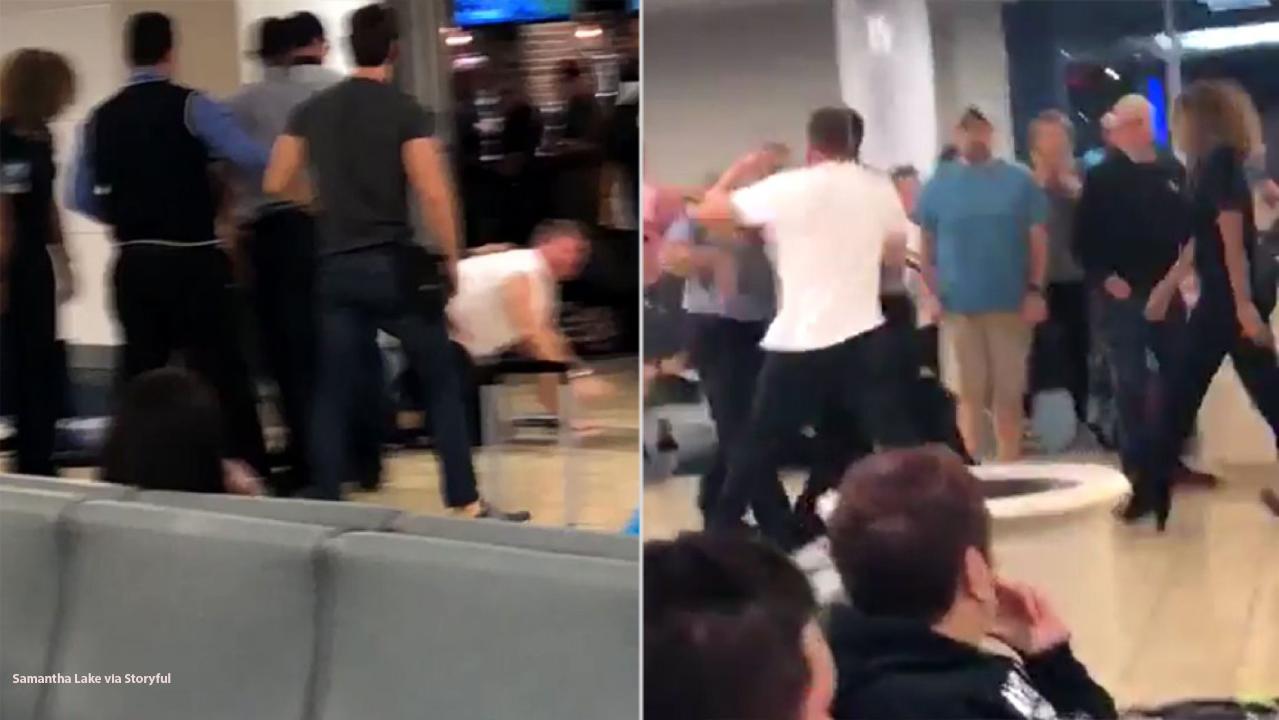 Intoxicated passenger filmed fighting with JetBlue staff, resisting police