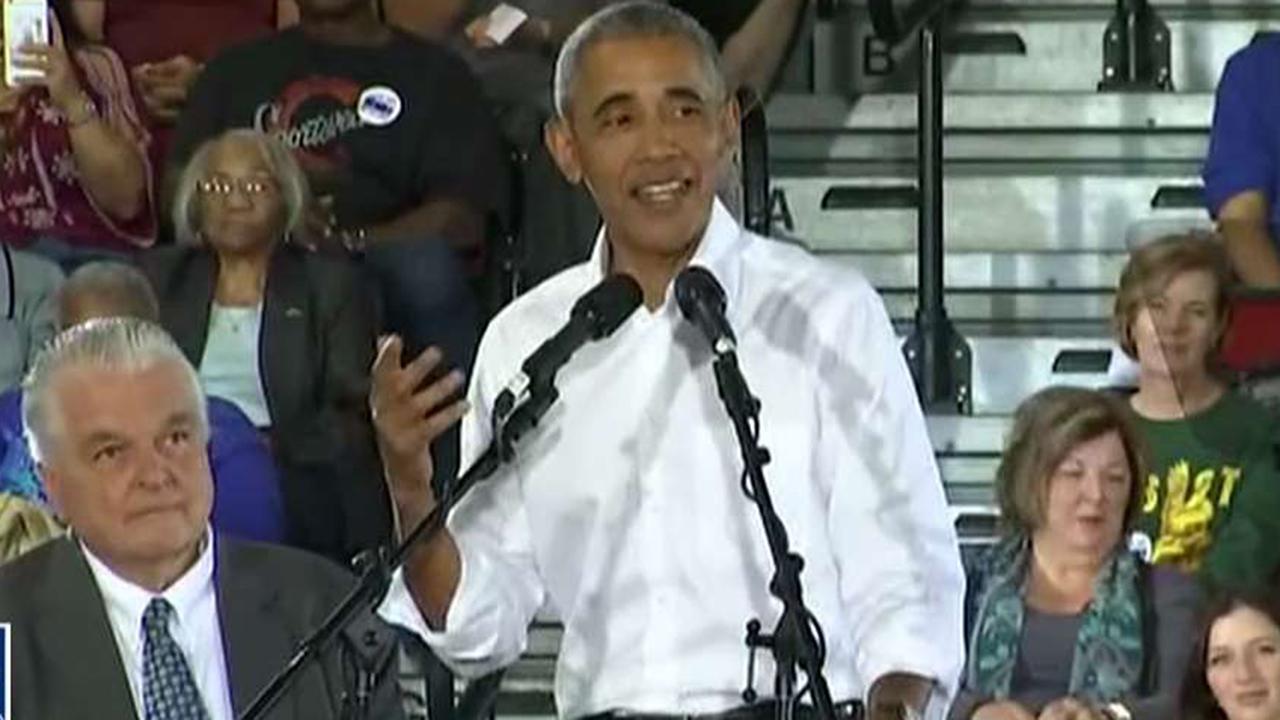 Obama takes credit for economy during rally