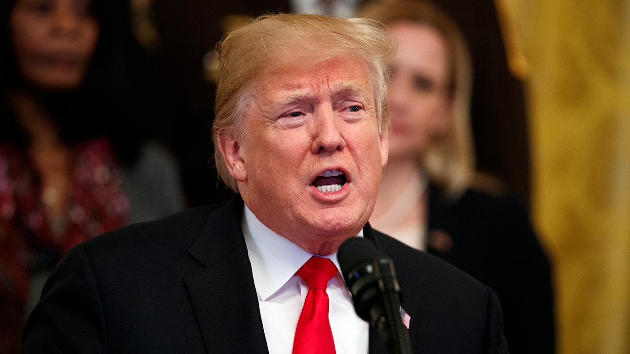 Trump speaks at reception in the White House East Room