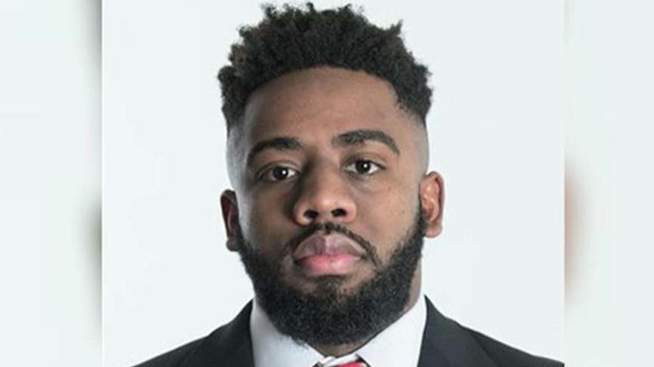 Rutgers football player charged in double murder plot