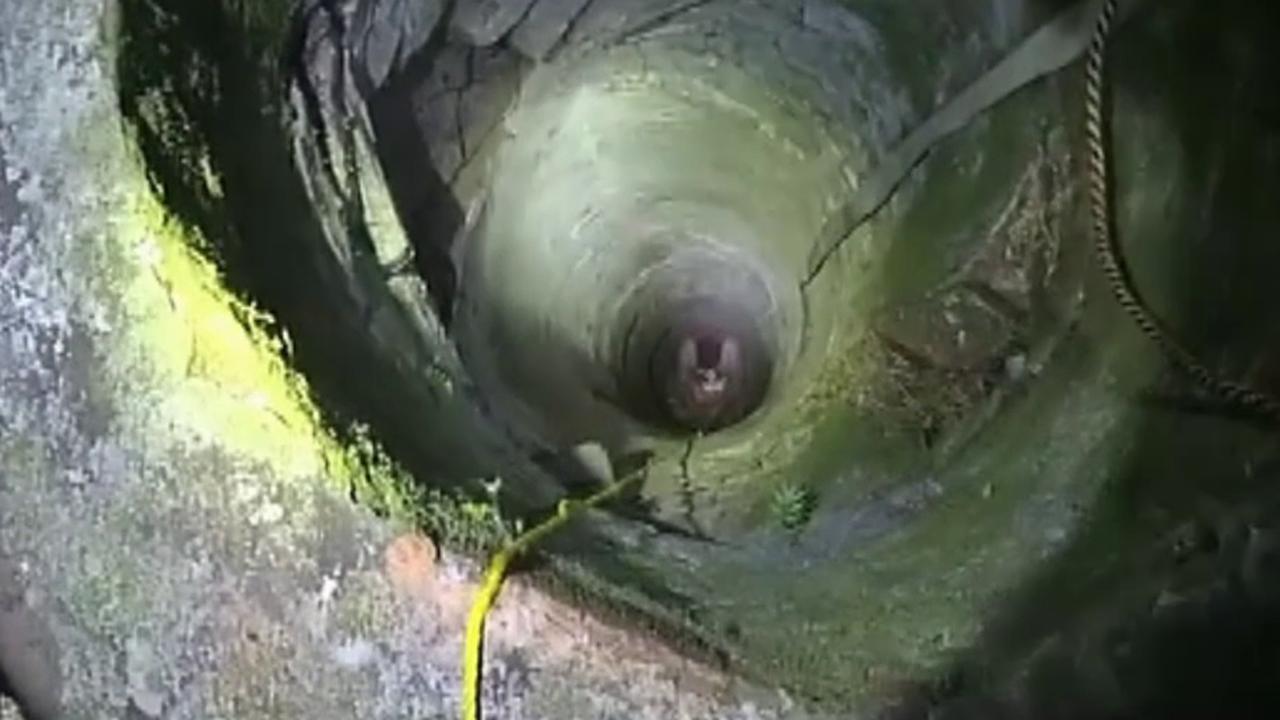 Rescue team pulls man out of thirty-foot deep well