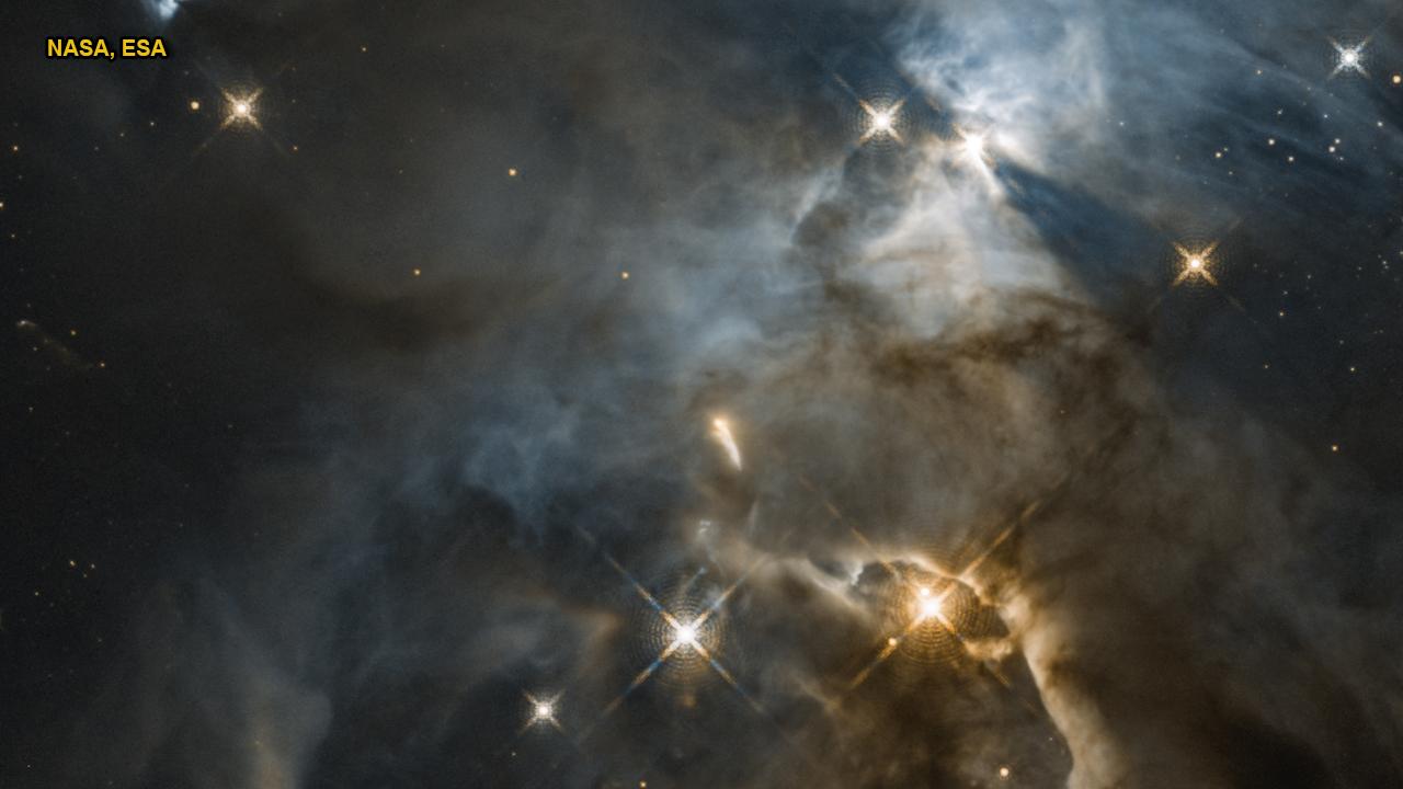 Hubble captures cosmic 'bat signal' in space