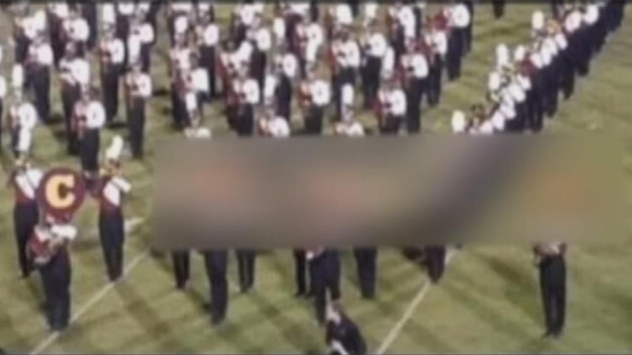 Marching band spells out racial slur during performance