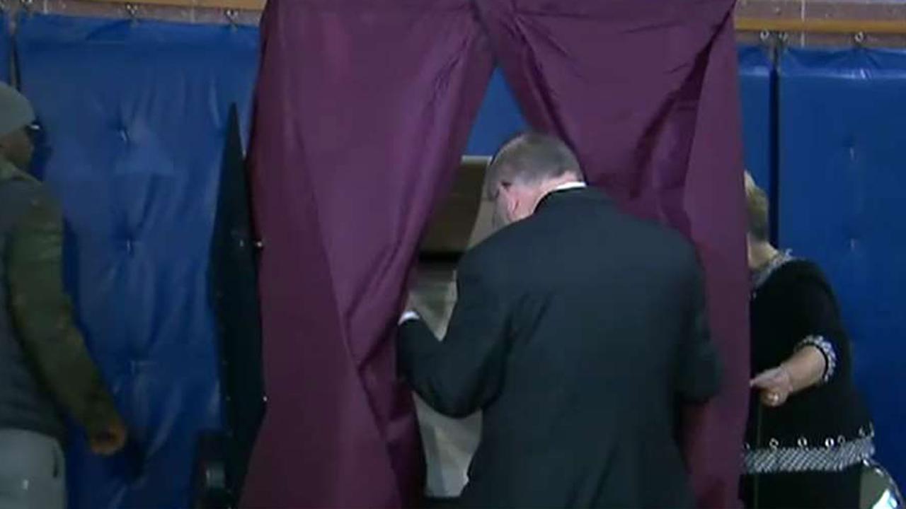 NJ voters head to polls in closer-than-expected Senate race