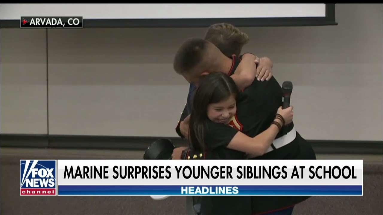 Marine Surprises Younger Siblings at Veterans Day Assembly