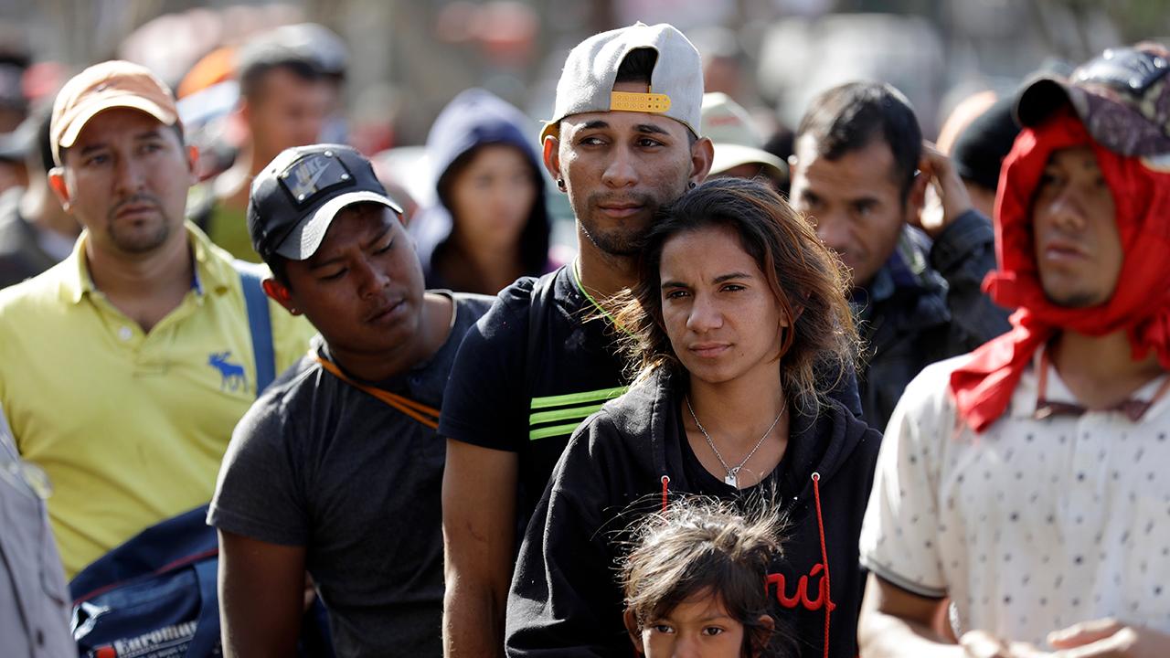 New questions about caravan as migrants arrive in Tijuana