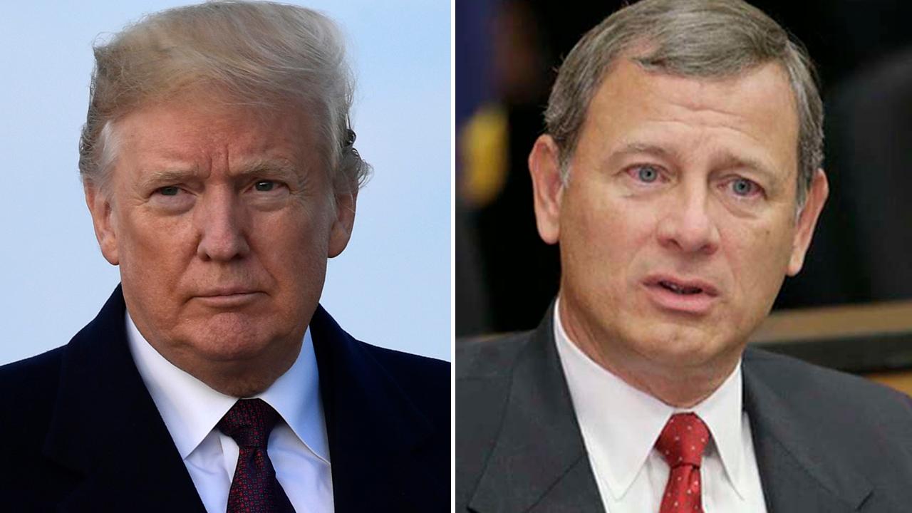 Trump, Chief Justice Roberts spar over role of judges