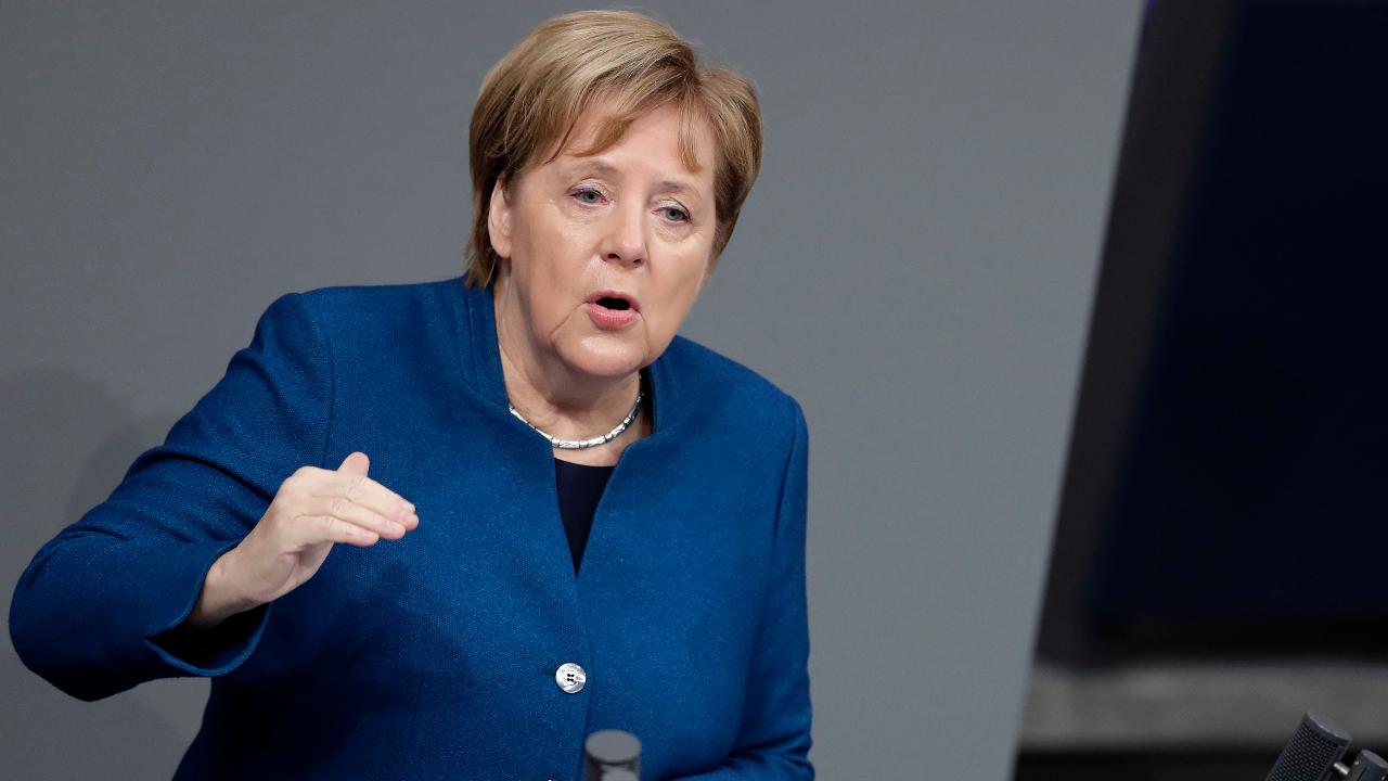 Merkel takes veiled swipe at Trump over nationalism