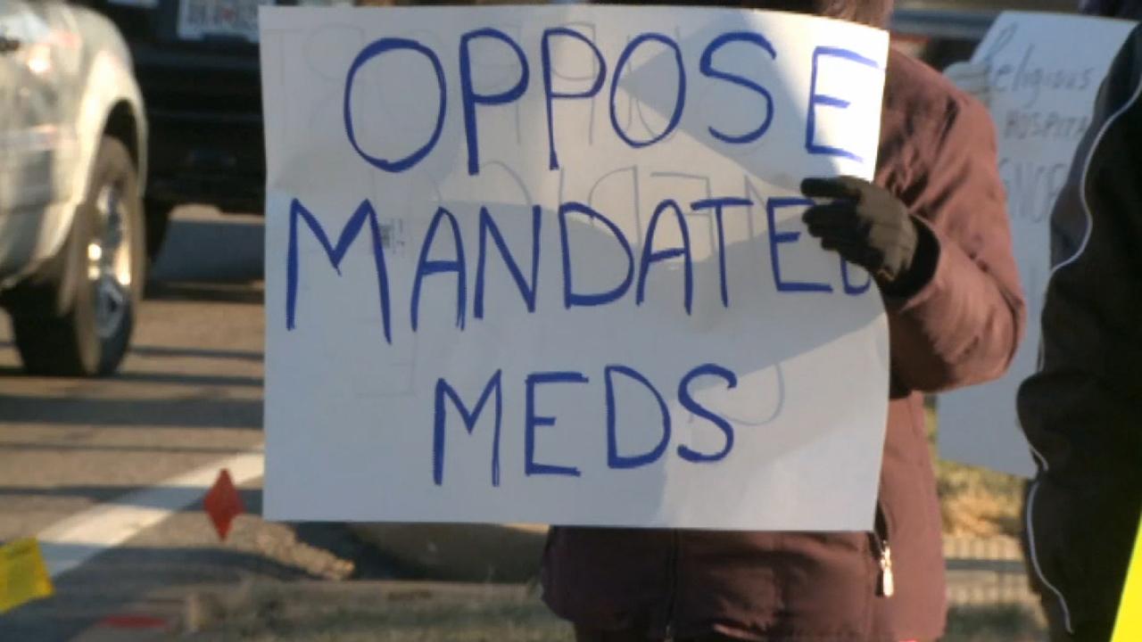 Protests after nurse allegedly fired for refusing flu shot