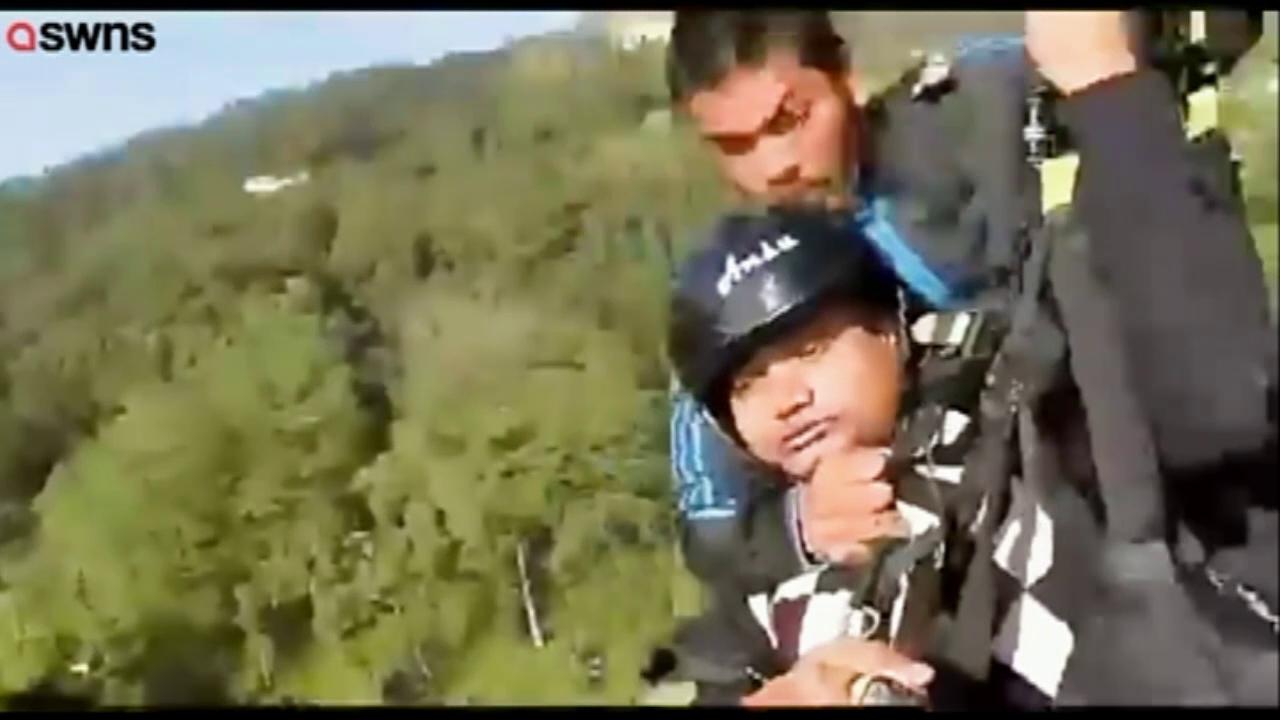 Paraglider pilot dies saving his passenger