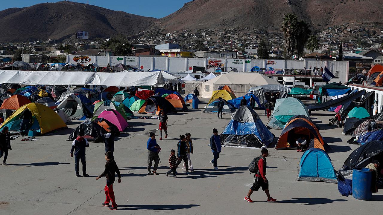 Migrants breach border amid asylum process frustrations