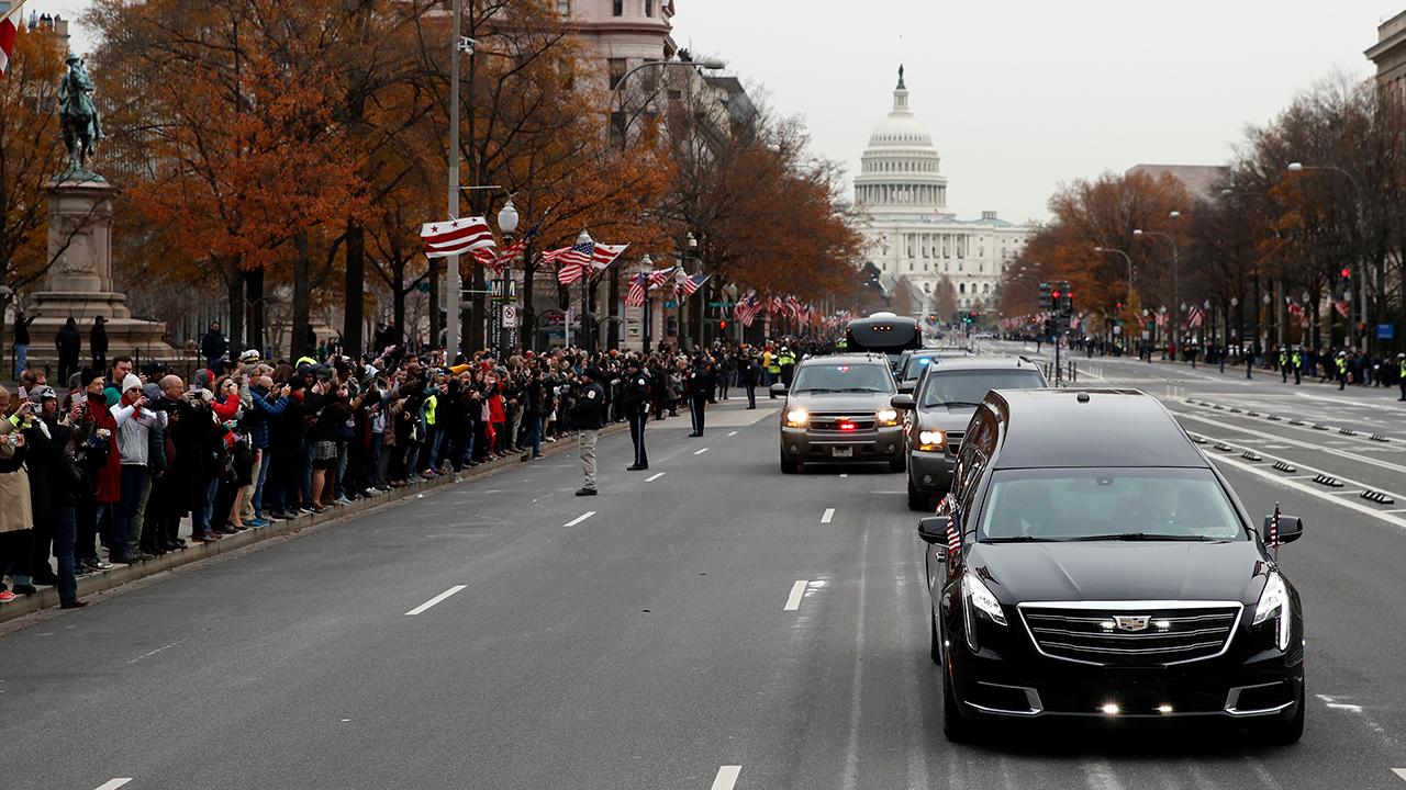 Mourners line streets to watch Bush 41 motorcade in DC