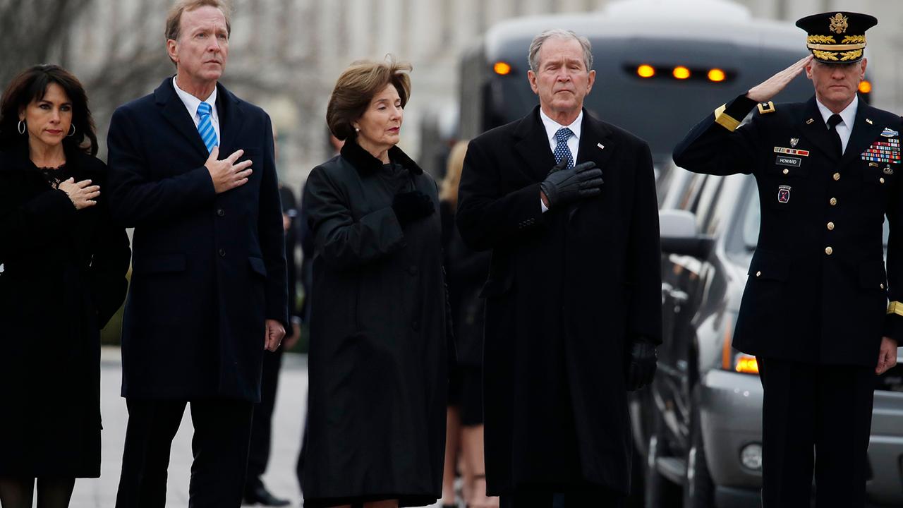 Bush family makes emotional goodbye to former president