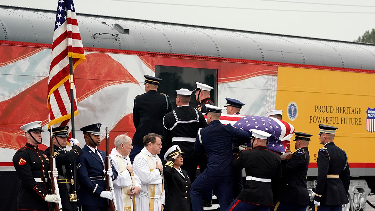 George H.W. Bush's casket carried onto funeral train